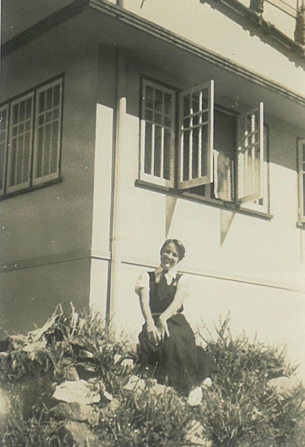 1956 Gloria Omodei outside Lower building