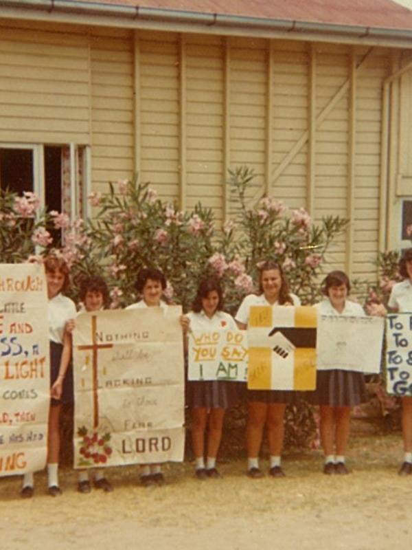 1977 Students with posters